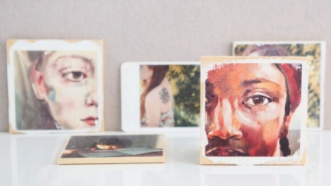 color photographs of people transferred to wood