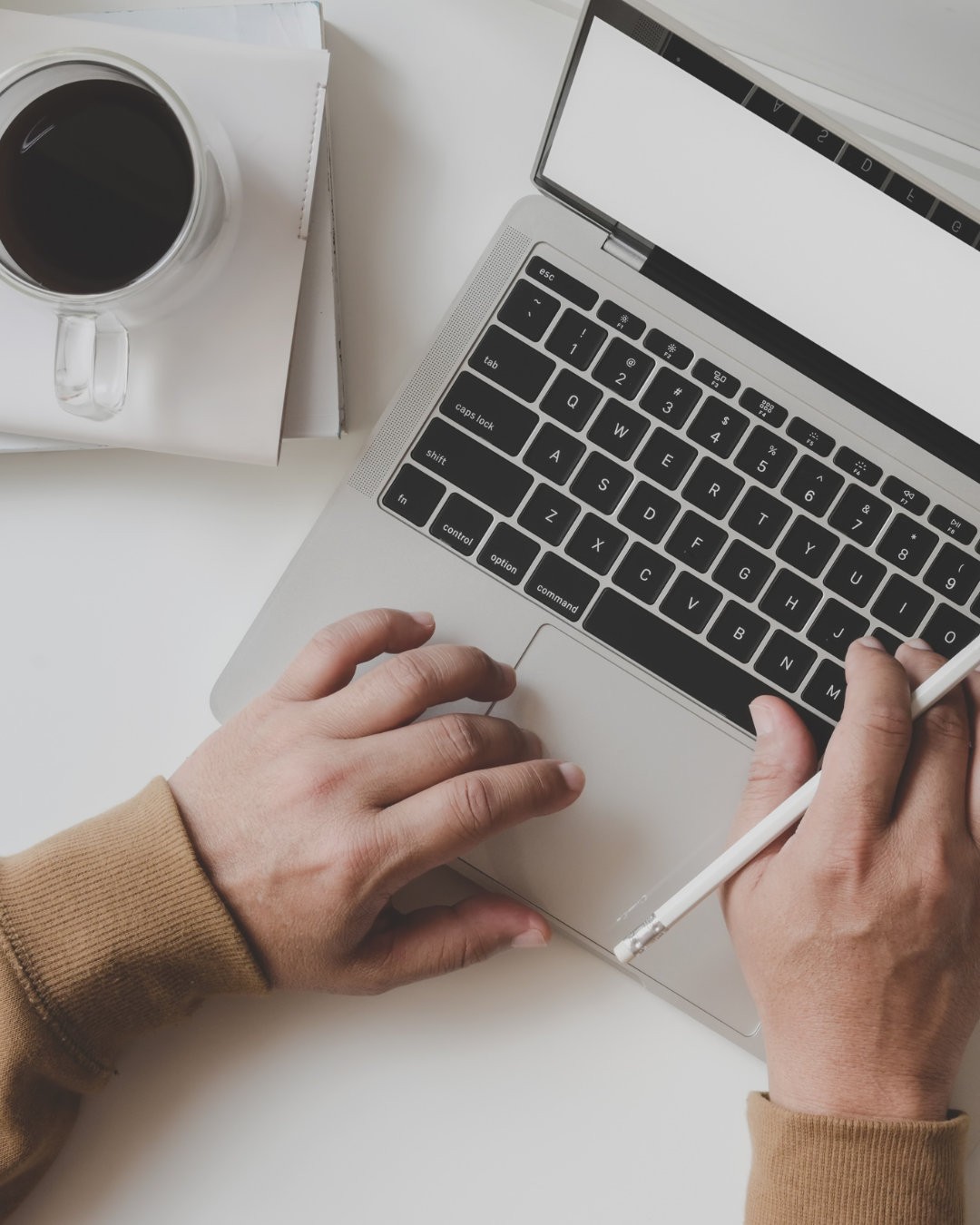 person typing on a keyboard